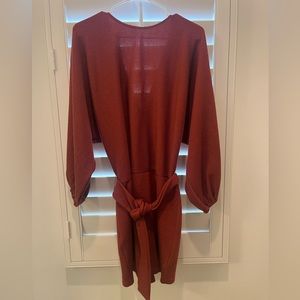 Women’s sweater dress midi length rustic brown orange color.